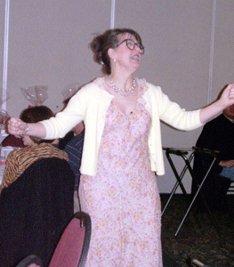 Valery Staskey Roeder as Lois making a romantic aside