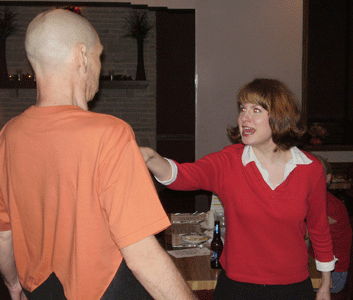 Moocy (Maura Schneider) bullies Chuckie Brown (Bert Furioli).