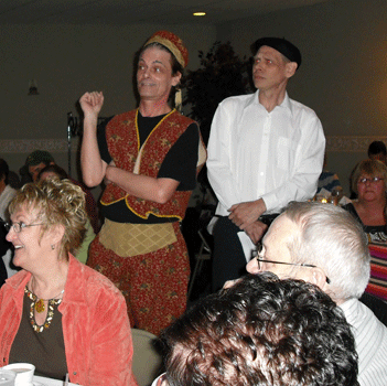 Ricky and Fred watch Orton audition some dancers.