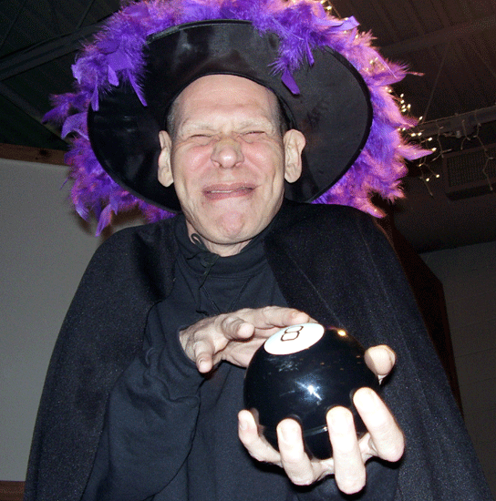 Bert Furioli as the Wicked Witch trapped inside a warlock's body.